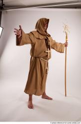 JOEL_ADAMSON STANDING POSE WITH A MAGIC STICK